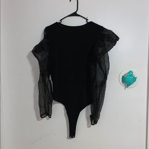 Black ruffled armed body suit